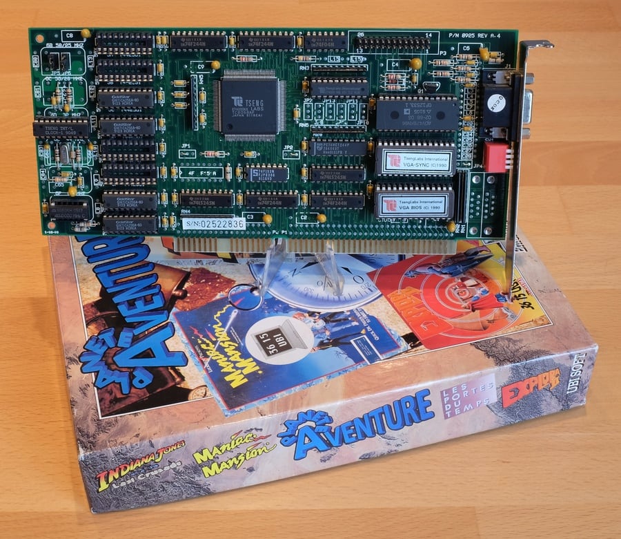 Tseng Labs ET4000AX ISA card on top of the "Planète Aventure" box